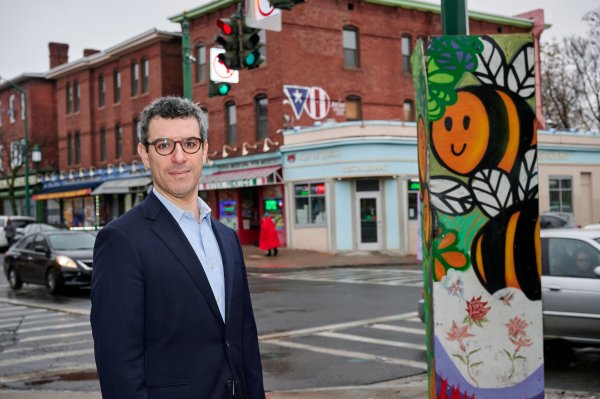 Andy Horowitz, state historian and associate professor of history, stands along Part Street in Hartford on Feb. 23, 2024. (Peter Morenus/UConn Photo)